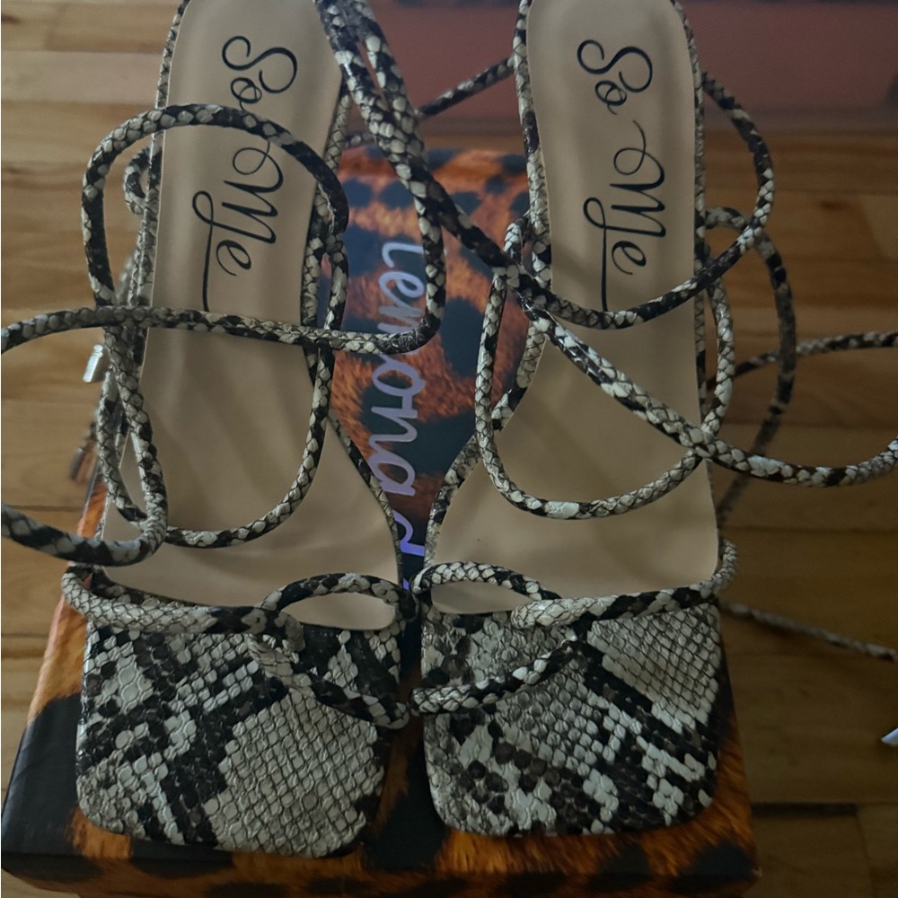 So Me Black and Cream Snakeskin Heels